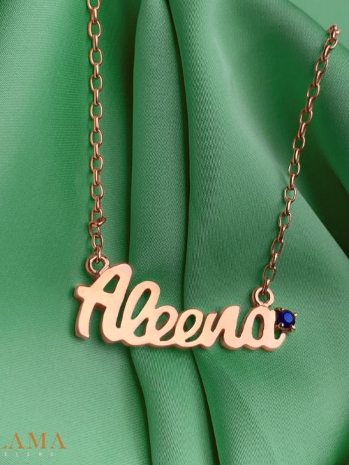 Crafted in rose gold plated sterling silver, this pendant is set with a hand picked round Blue Sapphire. Main Stone Blue Sapphire